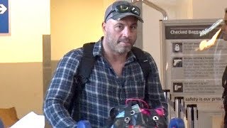 EXCLUSIVE  Joe Rogan Keeps It Together At LAX [upl. by Suravart802]